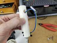 Exterior of air tunnel.  The hole with the wire doubles so the induction fan can pull hot air out of the electronics section.
