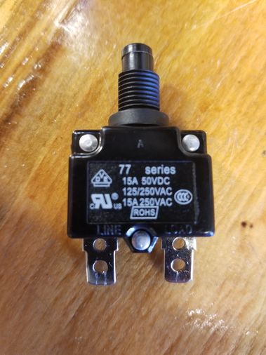 This little guy just decided to quit working. Image: Push-button resettable breaker.