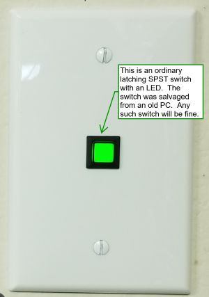 Image: A square green button.