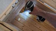 Remove these four bolts to transition to 'cabinet mode'.