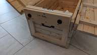 The first base-half installed on the end of the chest.
