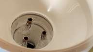 I had originally used PVC glue to seal these three pipes. But when I bumped them, a leak appeared.  So silicone is applied.