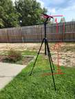 This sighting device is constructed of a BB gun scope, zip ties, a digital level, and a camera holder for the tripod.